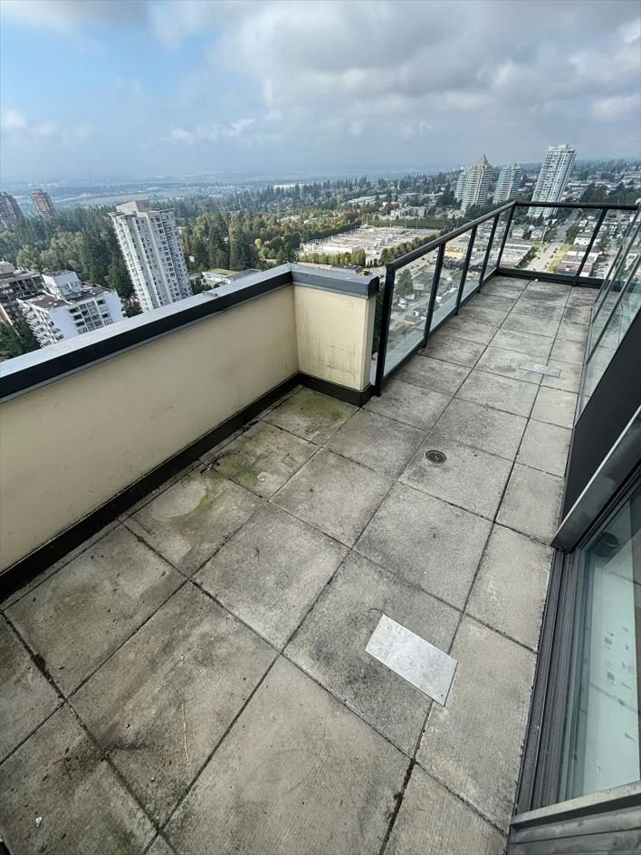 Dirty balcony prior to BalcoScrub's balcony deep cleaning