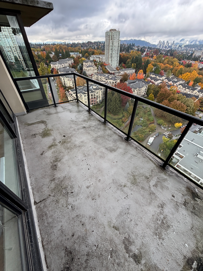 Dirty balcony prior to BalcoScrub's balcony deep cleaning