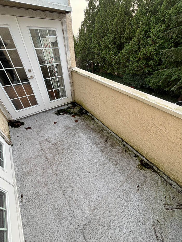 Dirty balcony prior to BalcoScrub's balcony deep cleaning