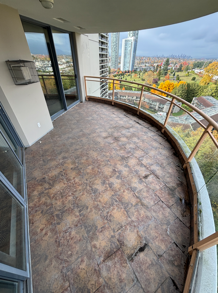 Dirty balcony prior to BalcoScrub's balcony deep cleaning