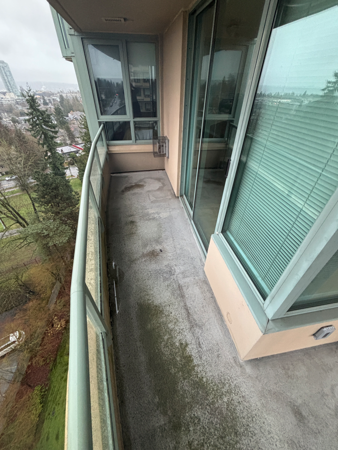 Dirty balcony prior to BalcoScrub's balcony deep cleaning