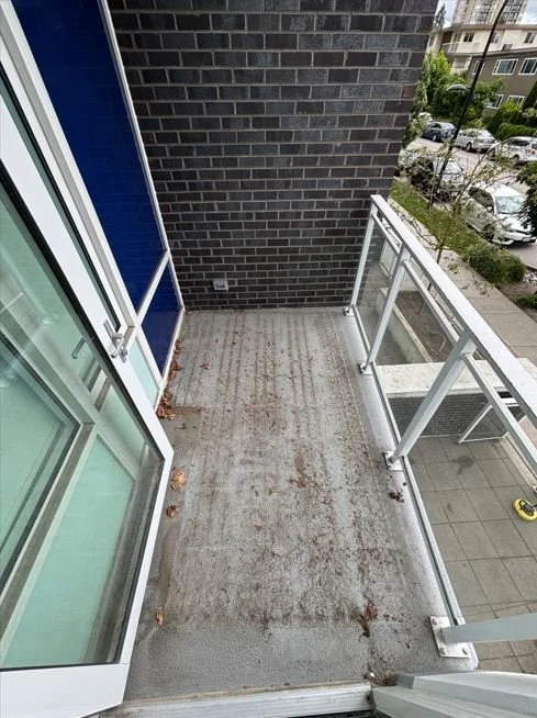 Dirty balcony prior to BalcoScrub's balcony deep cleaning