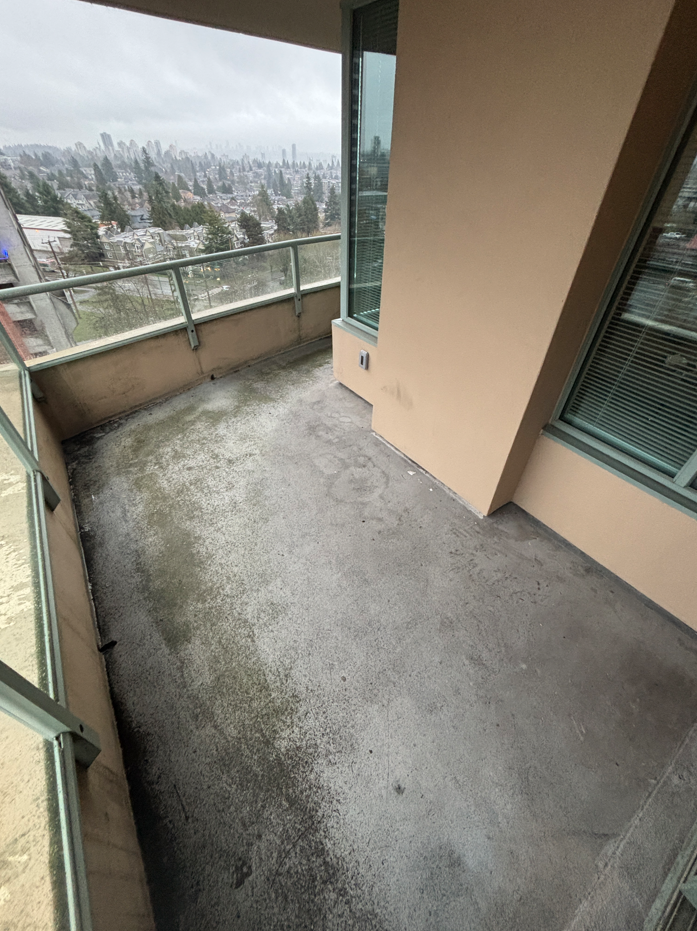 Dirty balcony prior to BalcoScrub's balcony deep cleaning