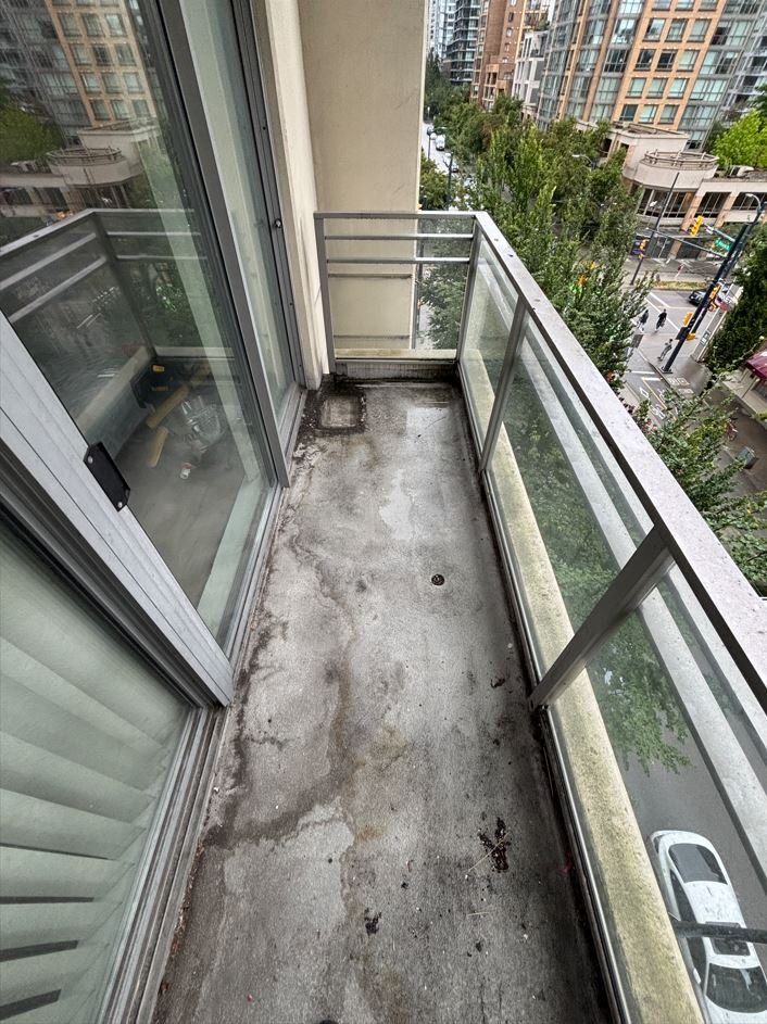 Dirty balcony prior to BalcoScrub's balcony deep cleaning