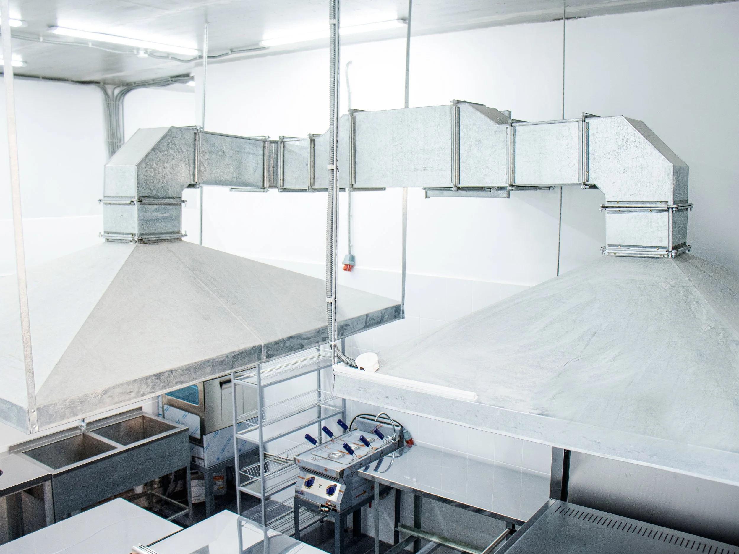 metal kitchen equipment in clean kitchen