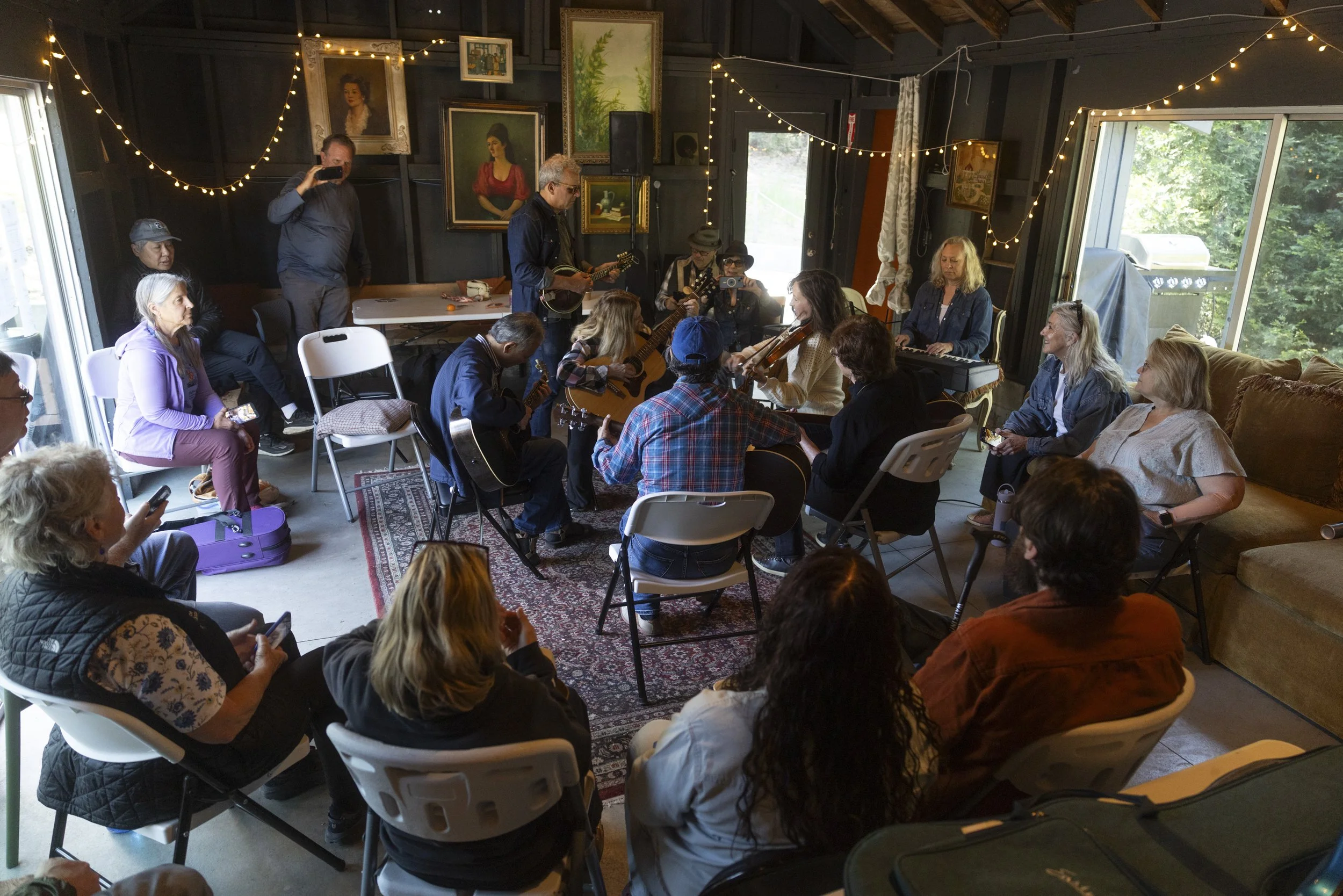 Fiddlers practicing in a barn