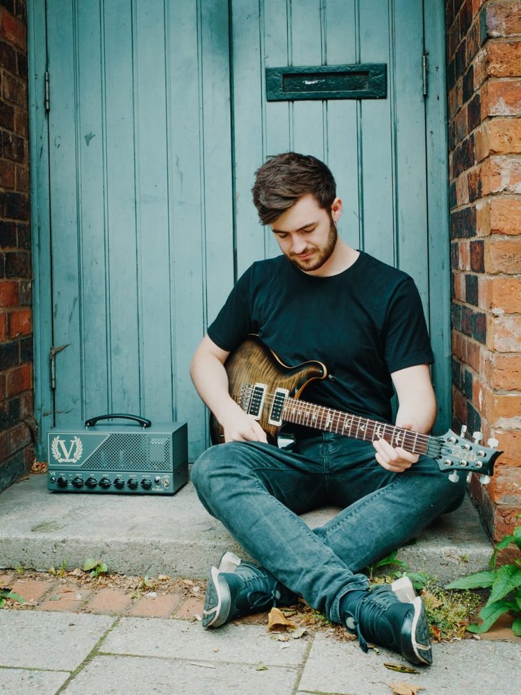 Joe Rowley playing guitar