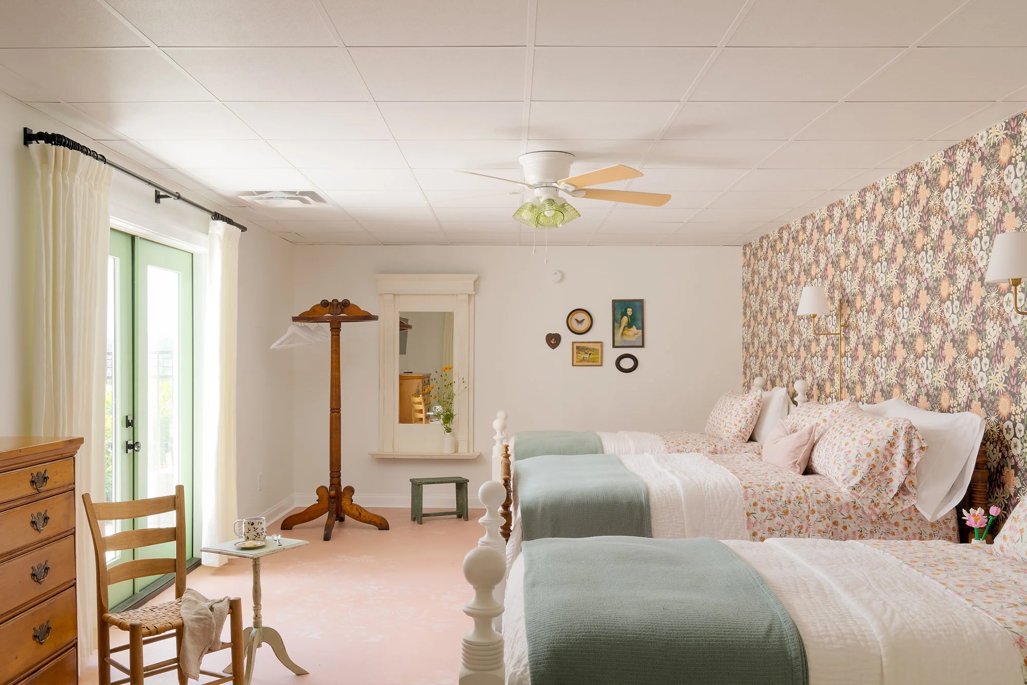 bedroom with three beds