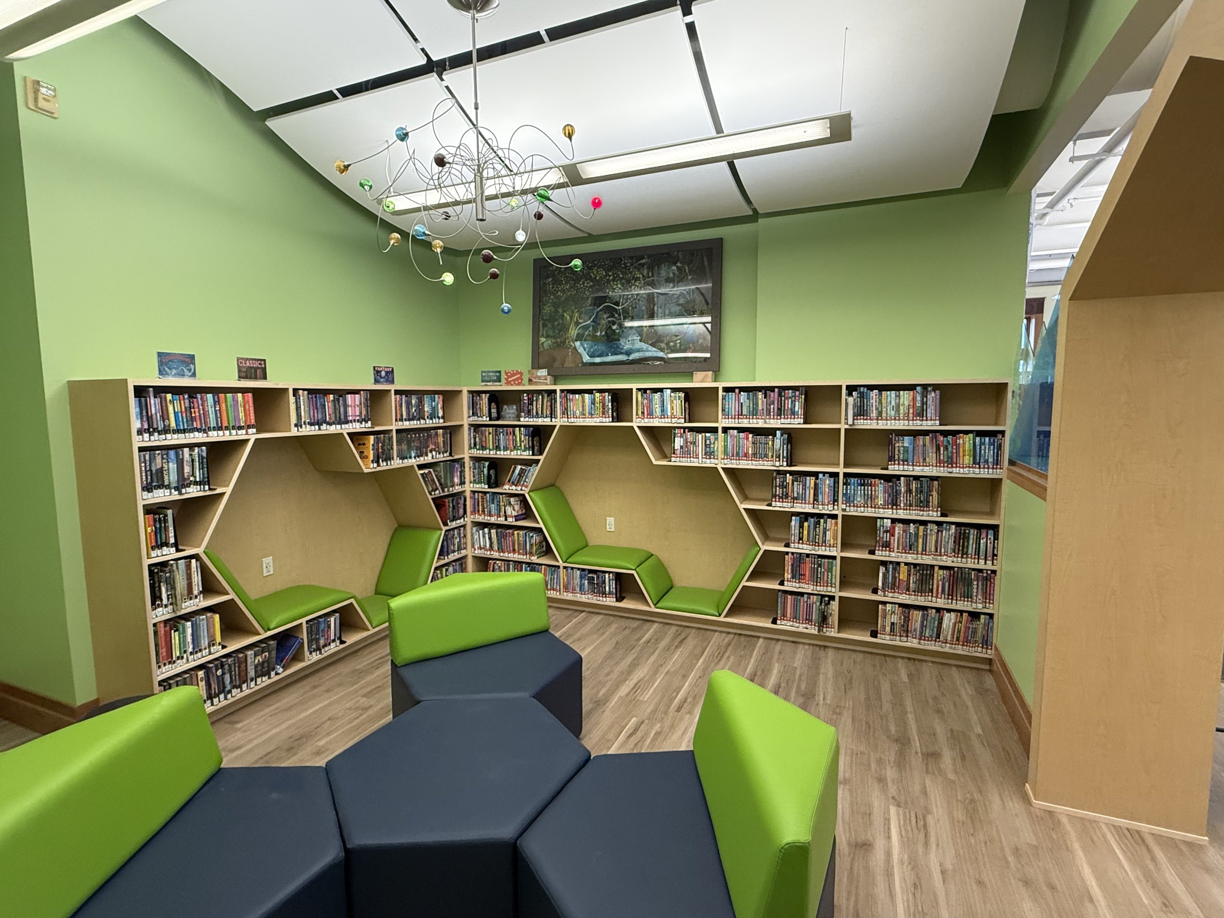 form and function combine with these custom maple shelving and seating units in the Wilkinson Public Library in Telluride, CO