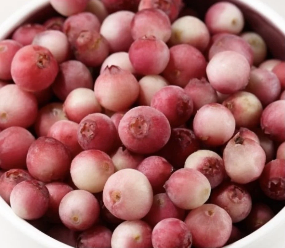 Close-up of pink lemonade blueberries.