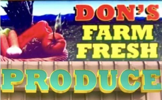 Signboard advertising Don's Farm Fresh Produce in Gallatin, Tennessee.