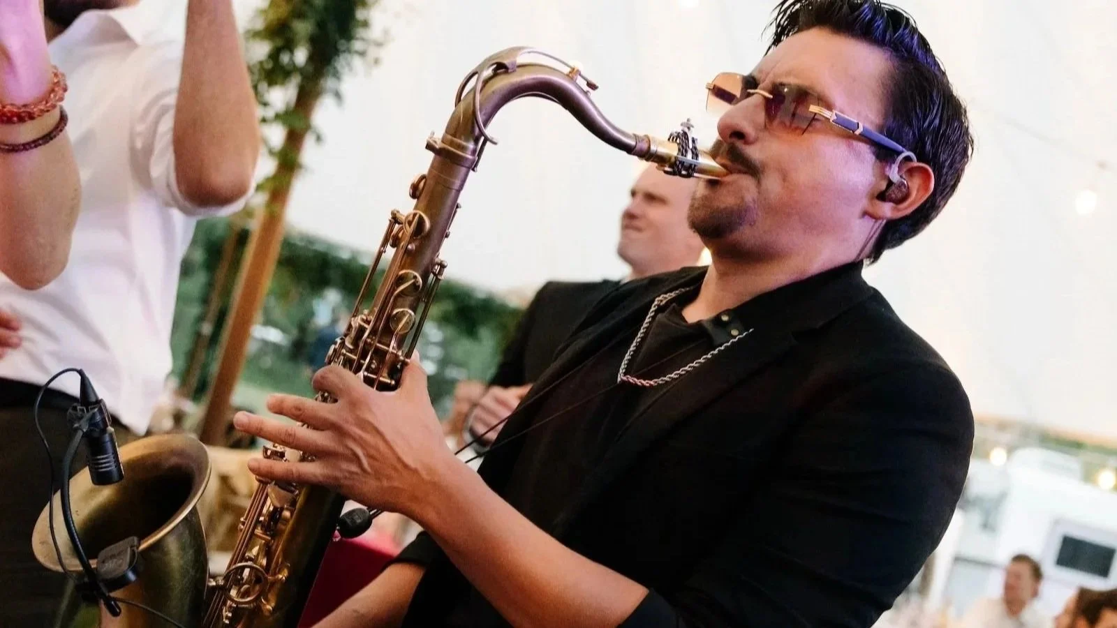Hybrid DJ Band with Sax performing at a luxury wedding in Sun Valley Idaho