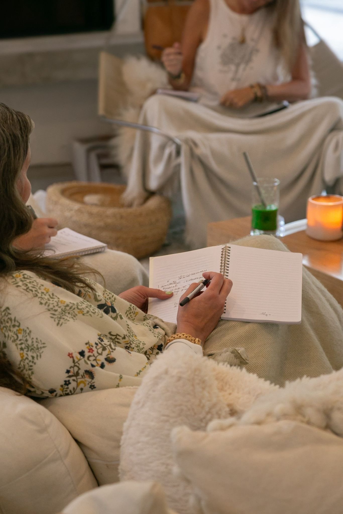 Woman-writing-at-camp-seed.JPG