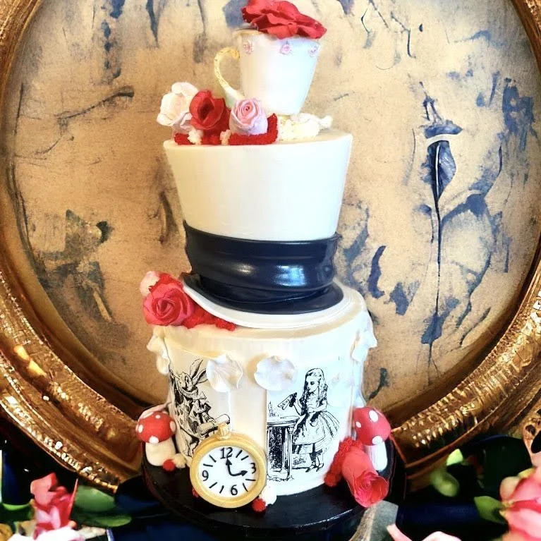 Alice in Wonderland cake with blue clock.jpg