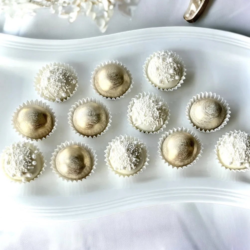 Wedding cake truffles in white and gold