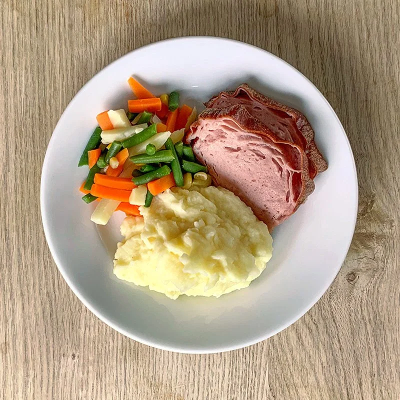 Fleischkäse Kartoffelstock Gemüse.jpg