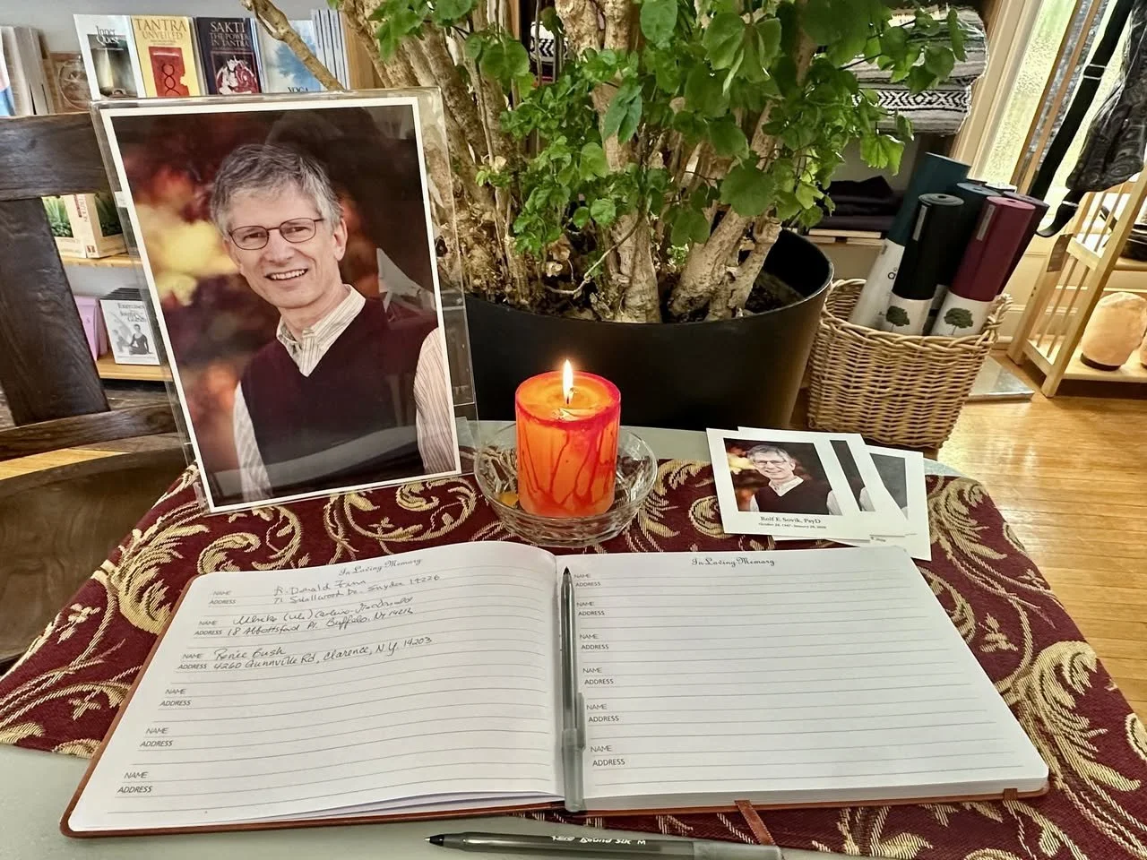 guest book and memorial candle