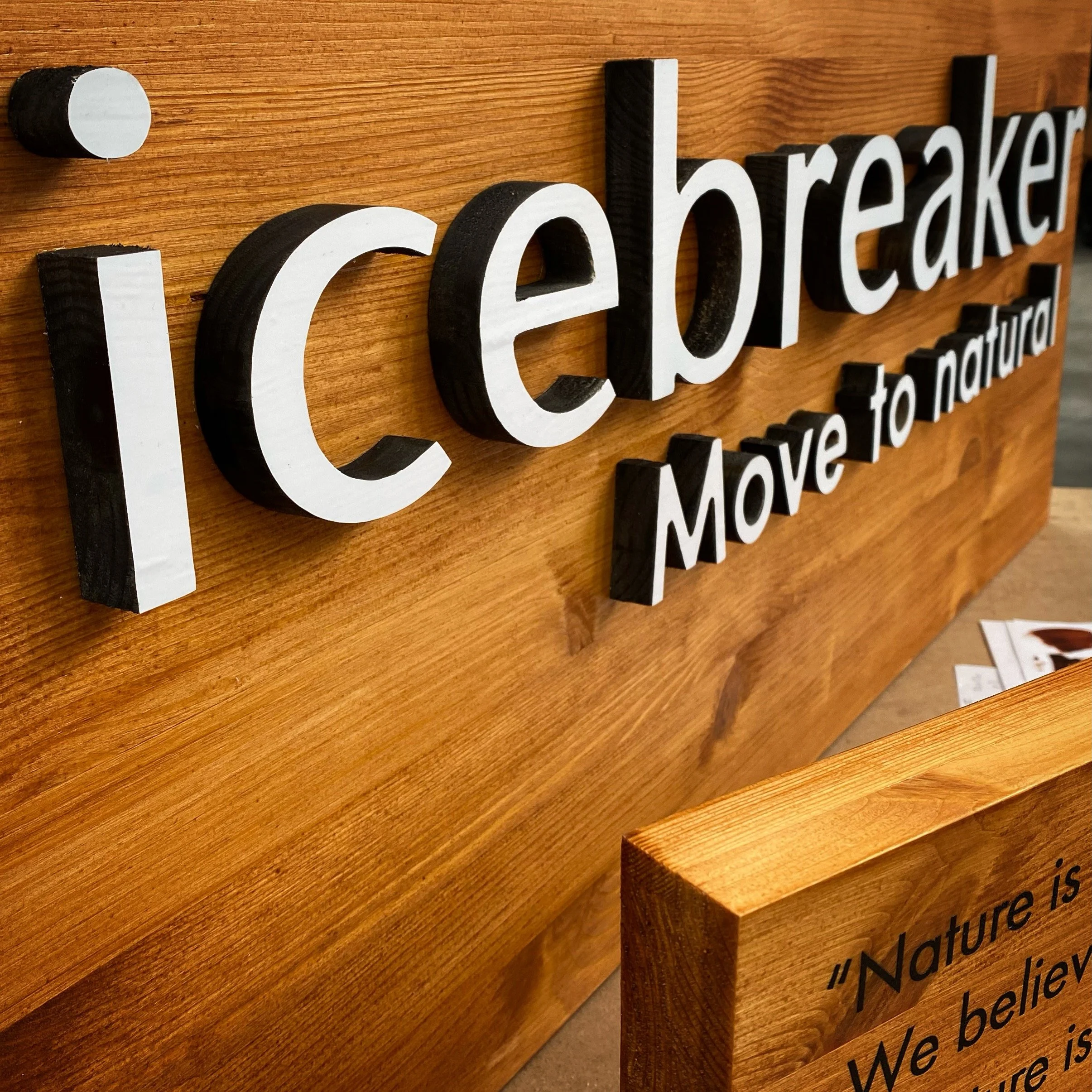POS display signage in combining wood and Perspex™