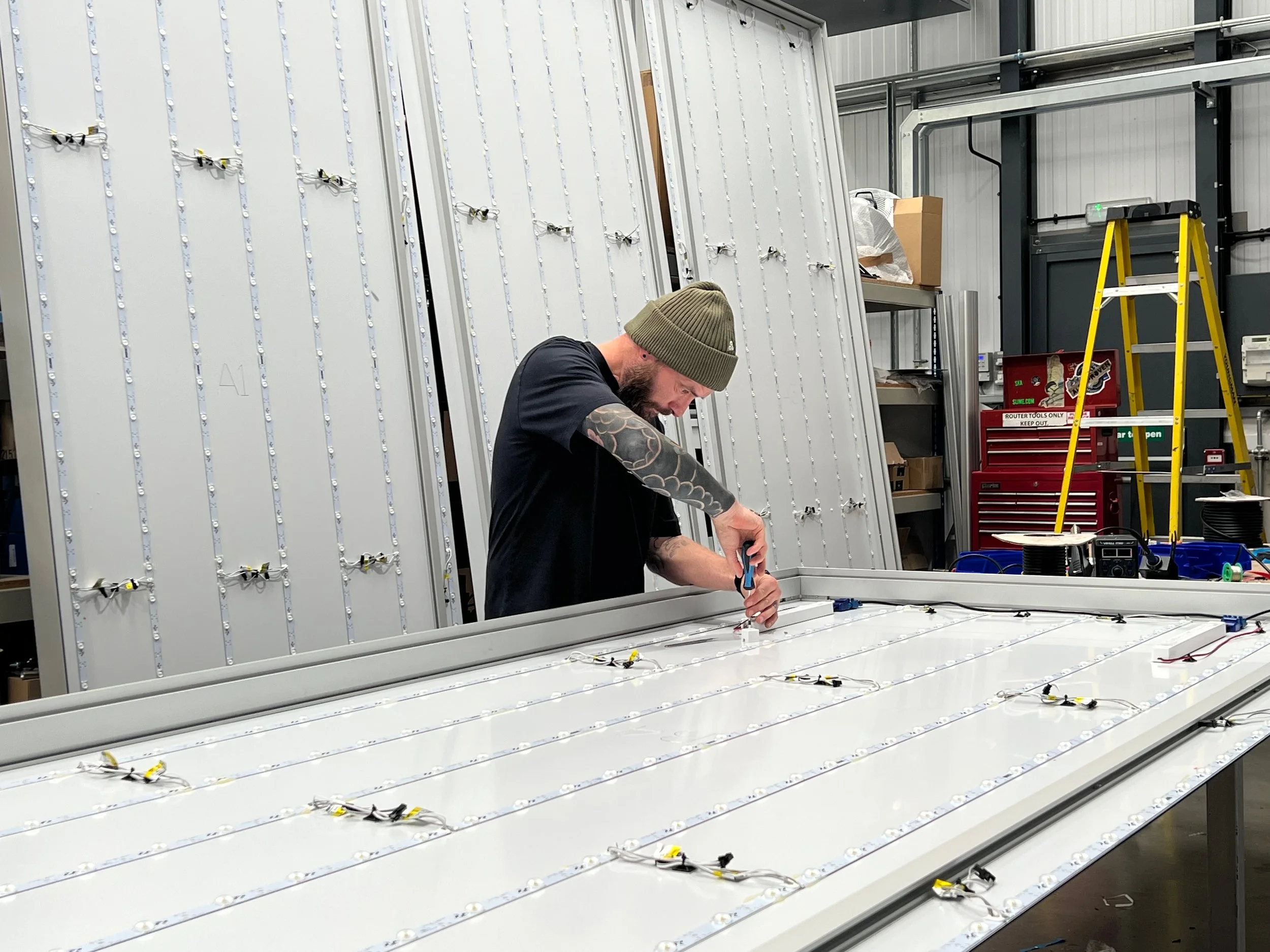 Prepping for launch — Behind the scenes in our workshop: precision engineering goes into every illuminated sign we produce.