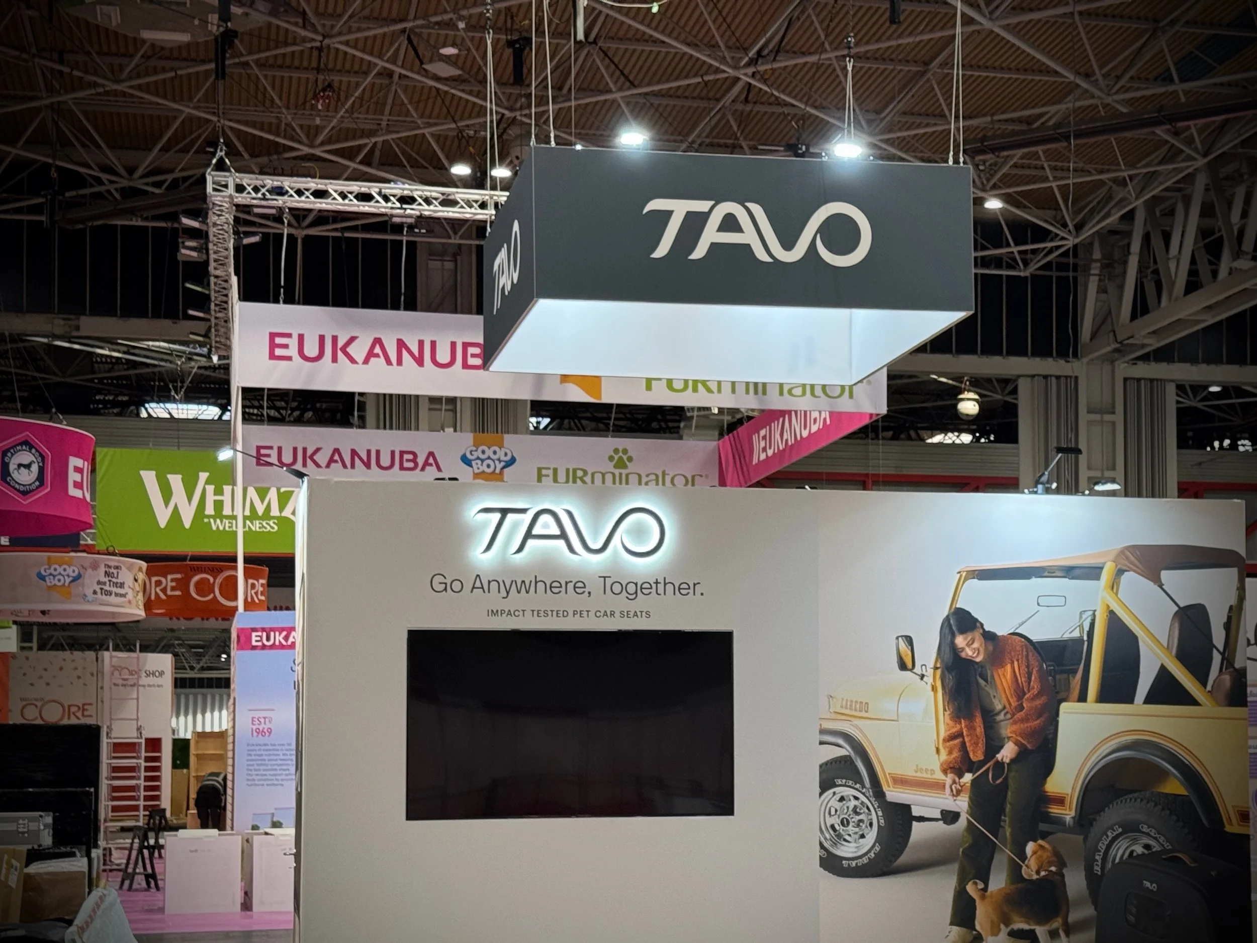 A simple square hanging banner that delivers bold, effective branding above the stand.