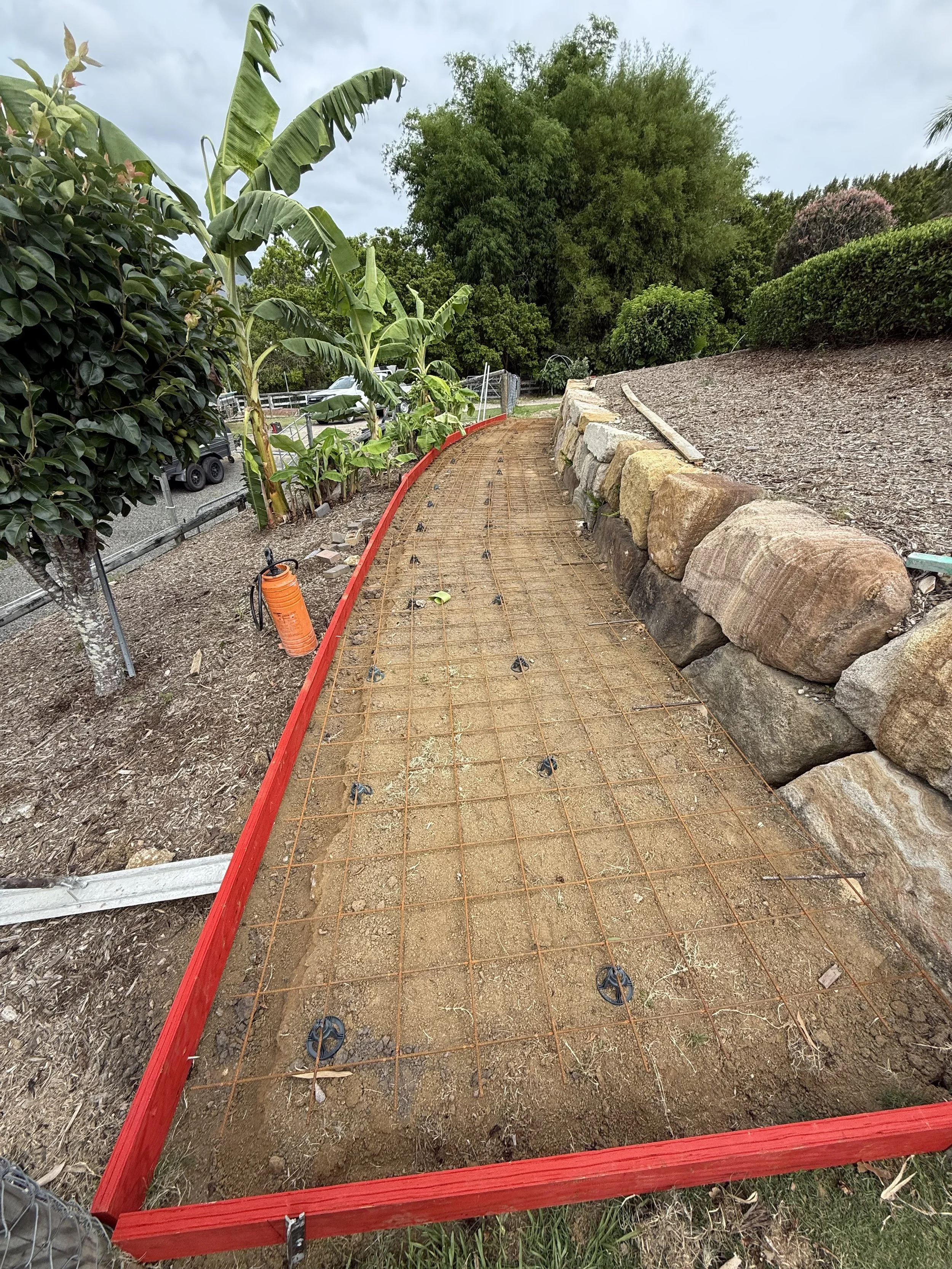 Concrete pathway installation on Gold Coast residential property