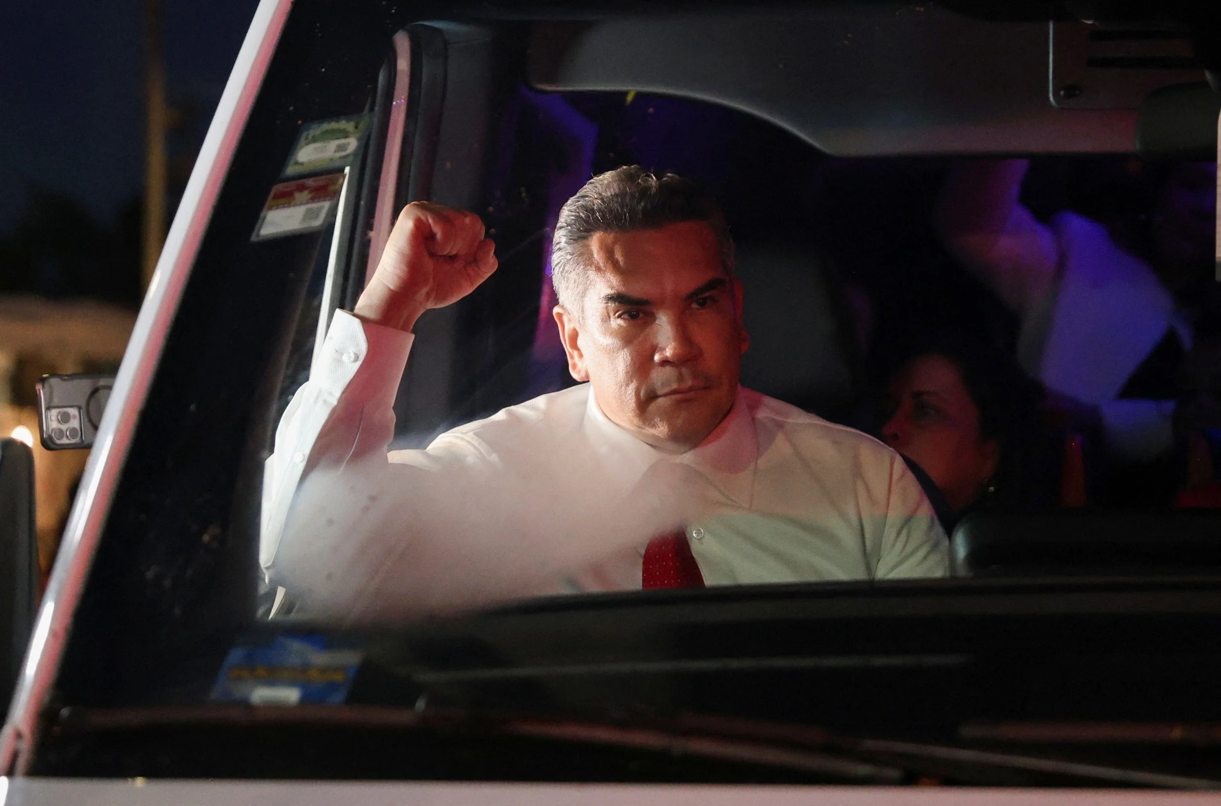 PRI leader Alejandro 'Alito' Moreno in a card with a raised fist after protesters stormed Mexico's Senate, on 10 September 2024.