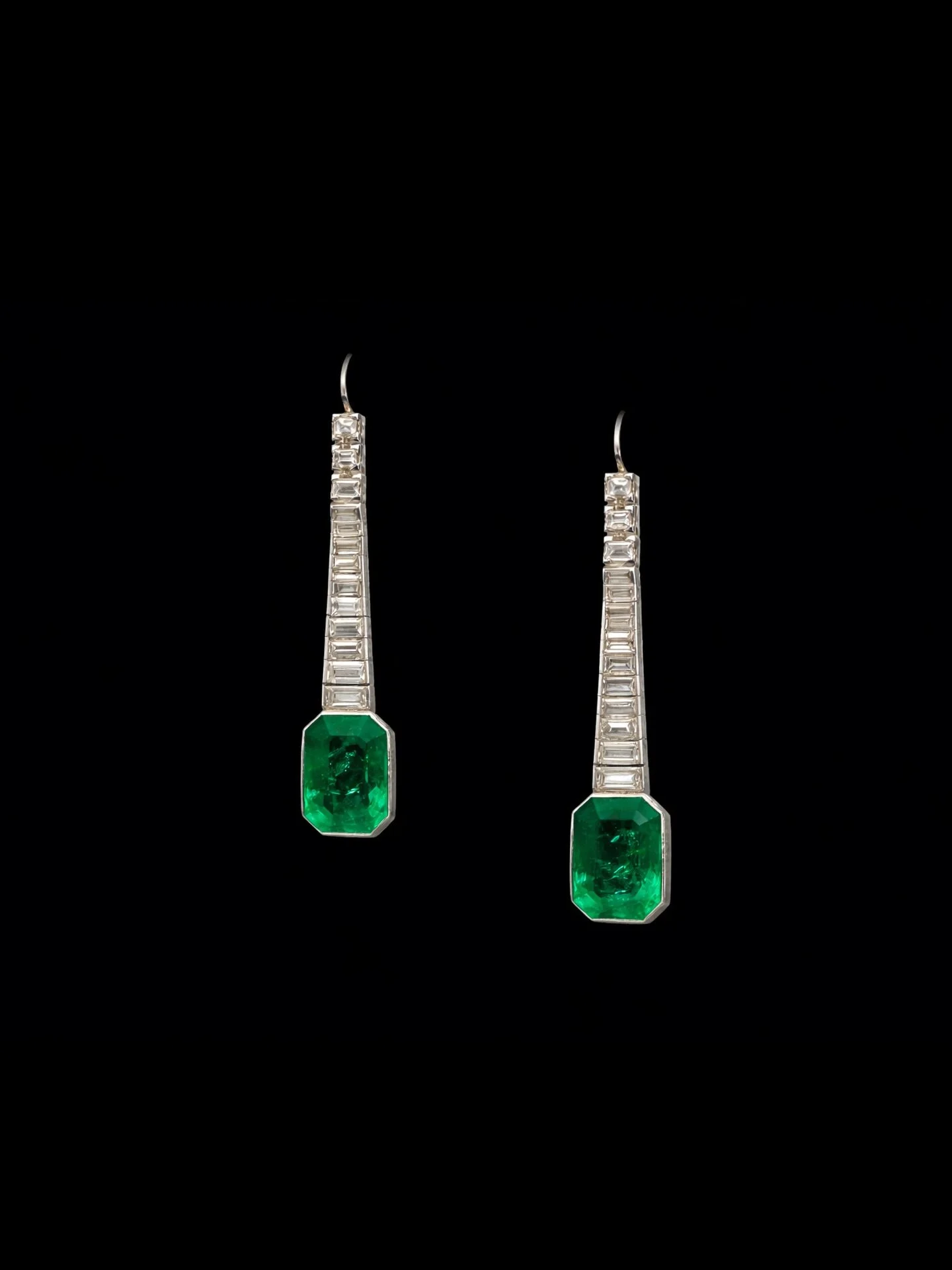 VINTAGE COLOMBIAN EMERALD &amp; DIAMOND EARRINGS

Set with Colombian emeralds with minor oil surrounded by baguette cut diamonds. Estimated emerald weight 3.20 &amp; 3.65 carats. Estimated total diamond weight 2.60 carats. Estimated colour G-H on ave