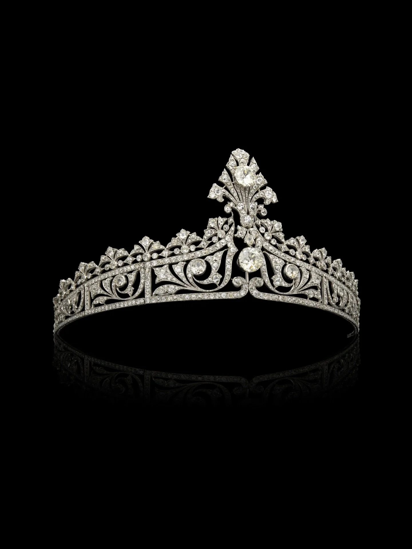 MAGNIFICENT ART DECO DIAMOND TIARA

Set with old european, old mine &amp; rose cut diamonds. Estimated centre diamond weight 5.80 carats &amp; 5.19 carats. Estimated entourage diamond weight 20.00 carats. Estimated colour J-K on average. Estimated cl