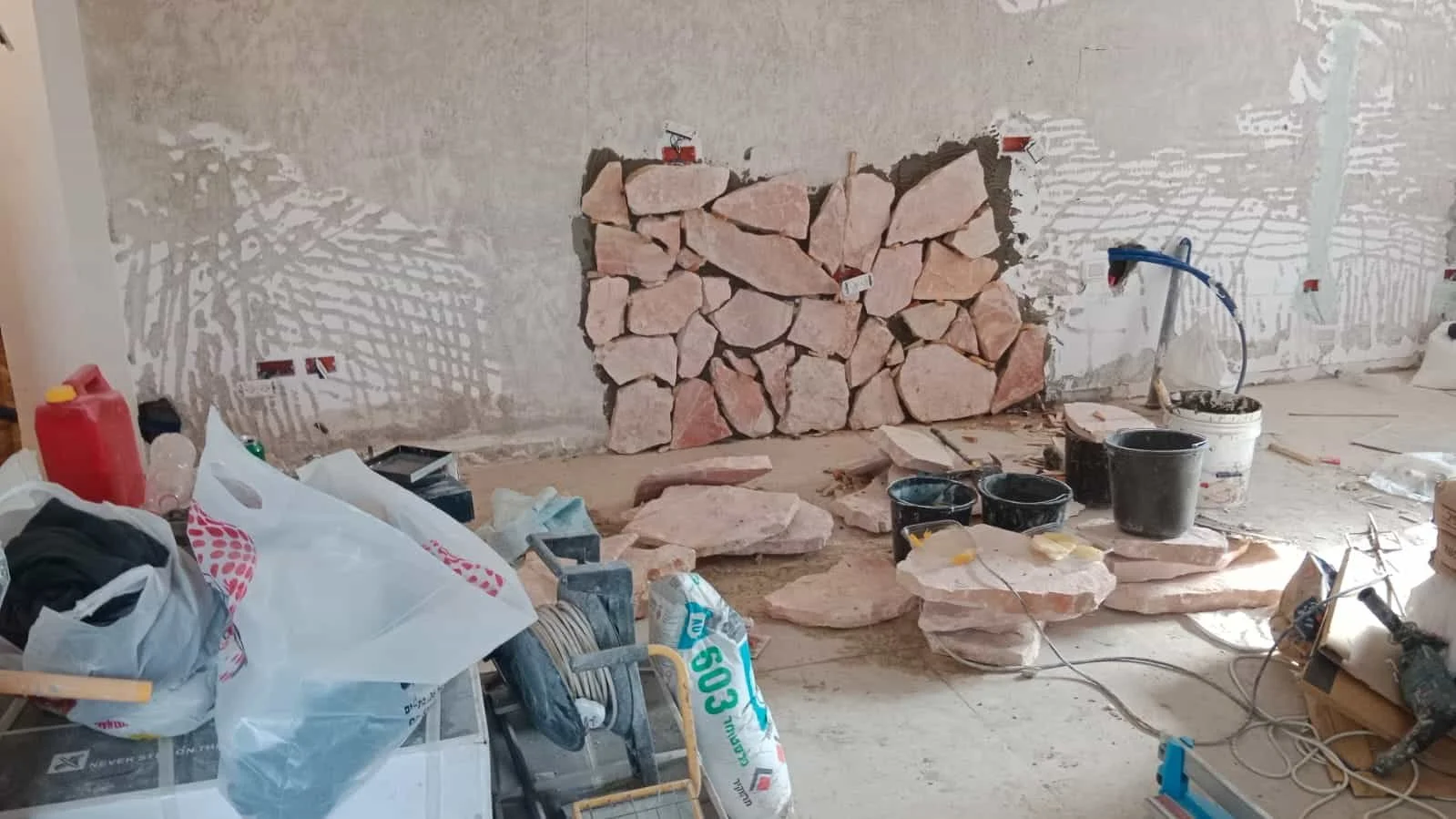 har-adar-stone-wall-cladding-interior-maor-renovations (7).jpg