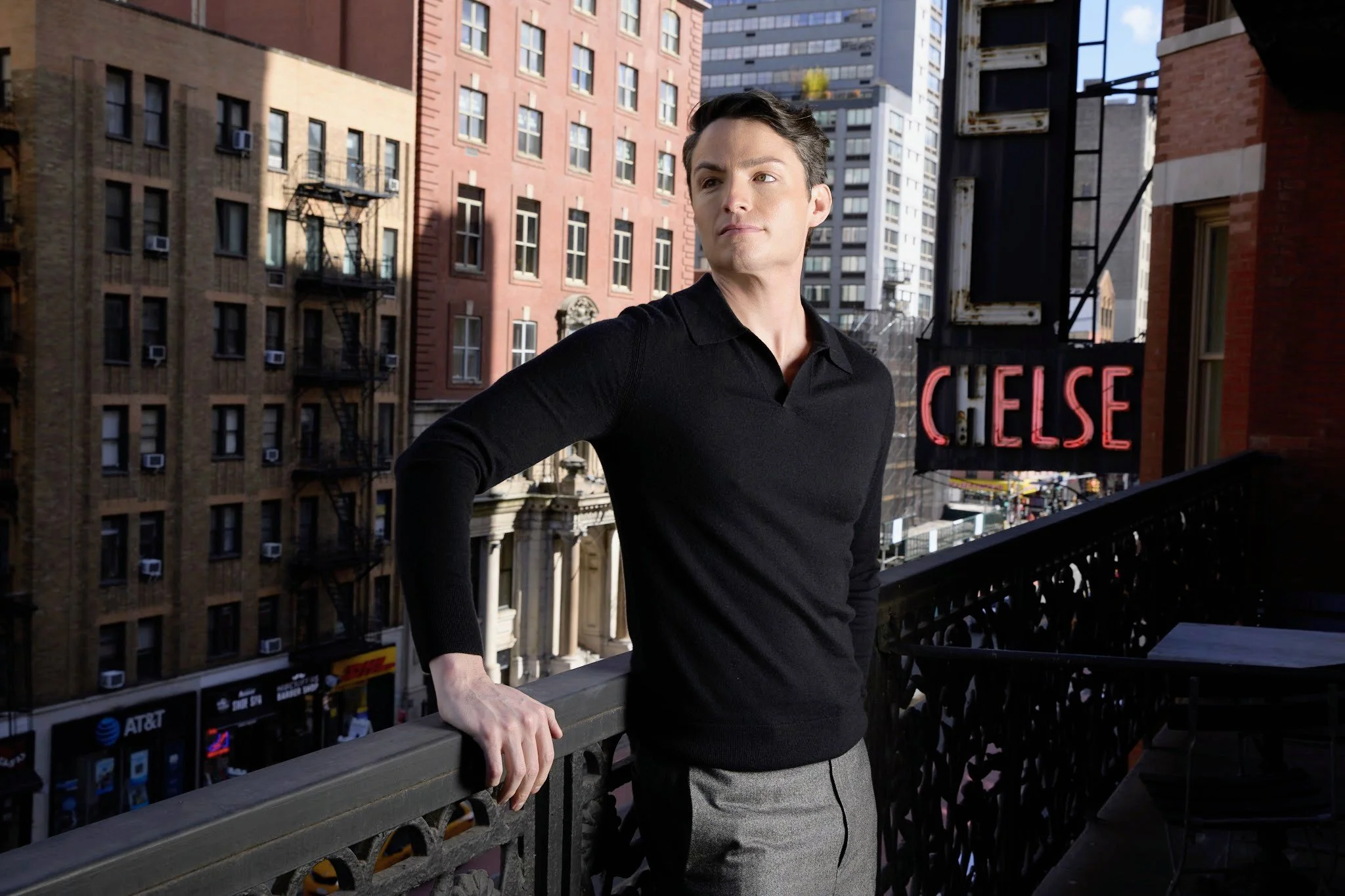 Michael D. Hughes on a balcony at the Chelsea Hotel in New York