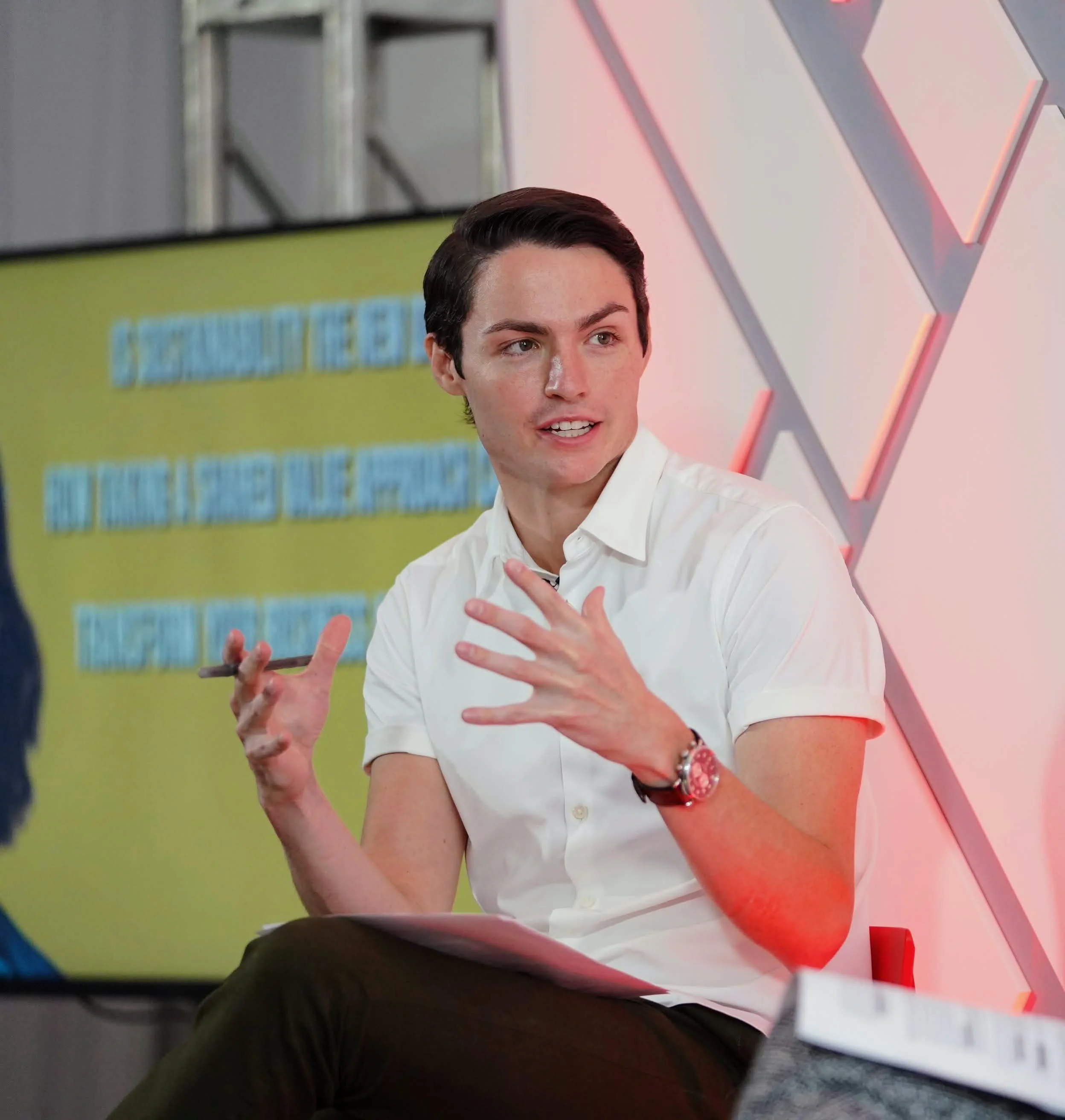 Michael D. Hughes speaking on stage