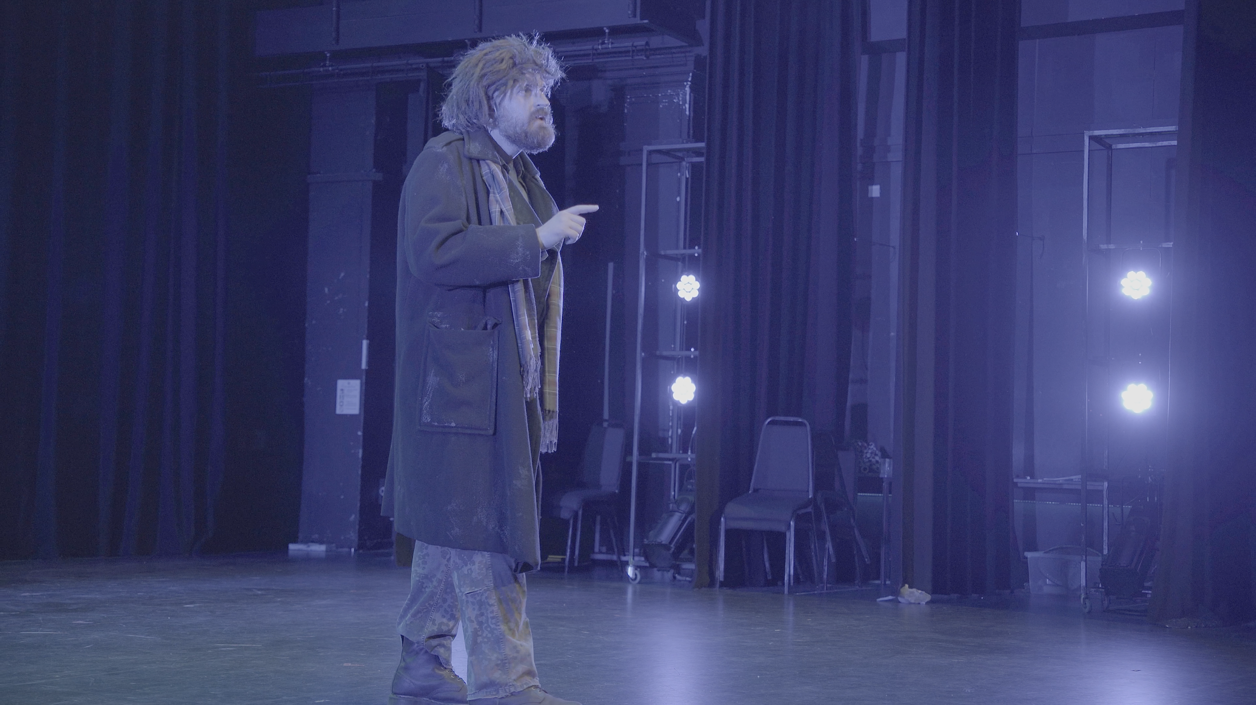 McGuffin talking to audience.png (Copy)