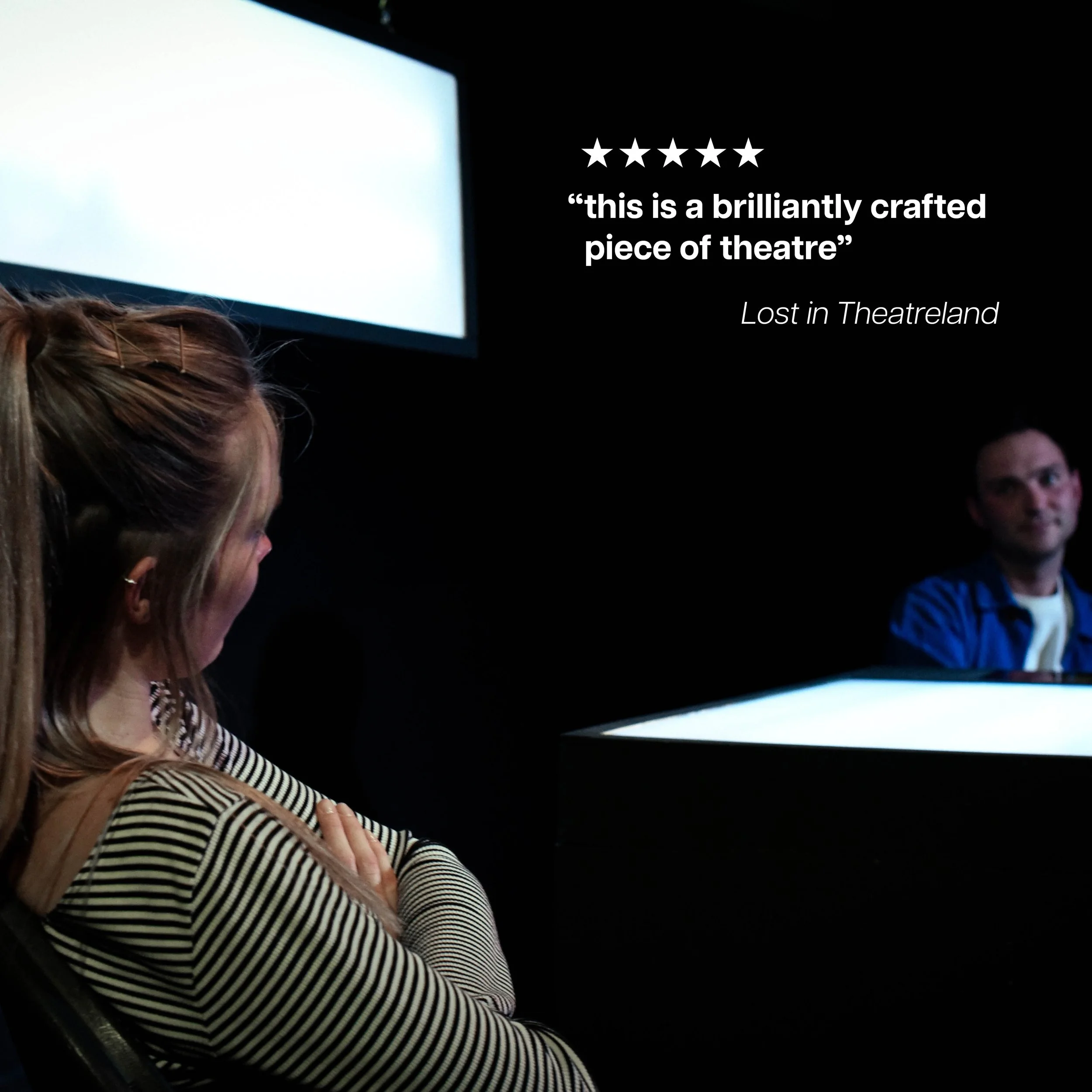 People sitting in a dark theater watching a performance, with a woman in the foreground and a man in the background, alongside a review quote describing the performance as a 'brilliantly crafted piece of theatre'.