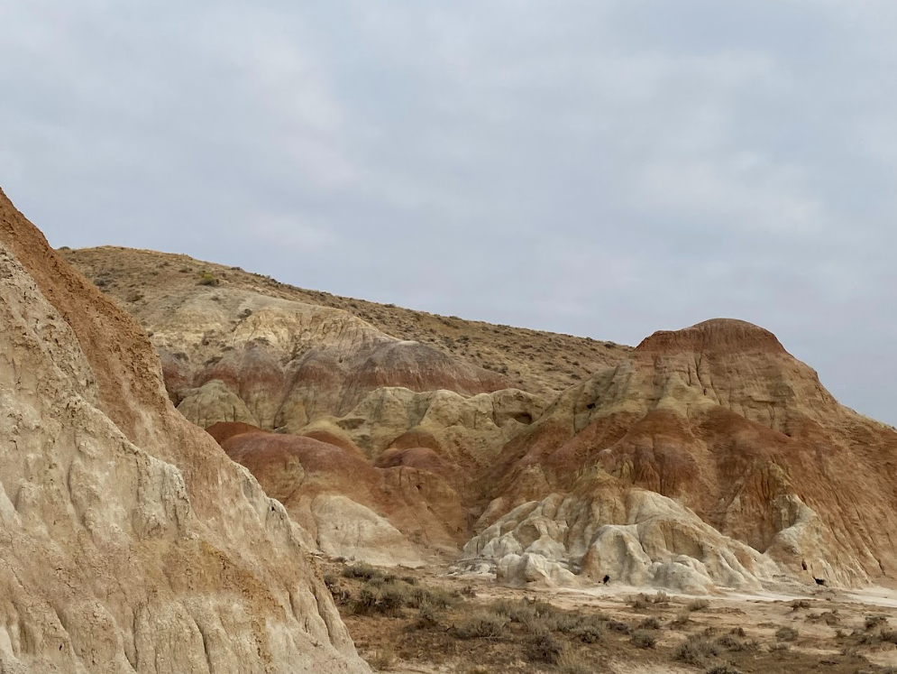 rock formations with gradients of color from red to yellow to blue to white