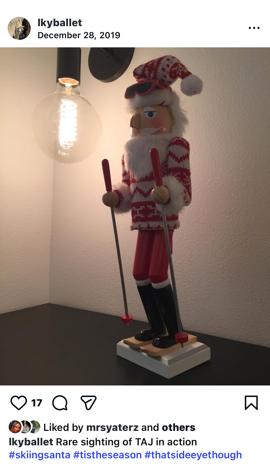 Skier in Nutcracker form with sunglasses and a sweater and Instagram caption that reads "Rare sighting of TAJ in action."
