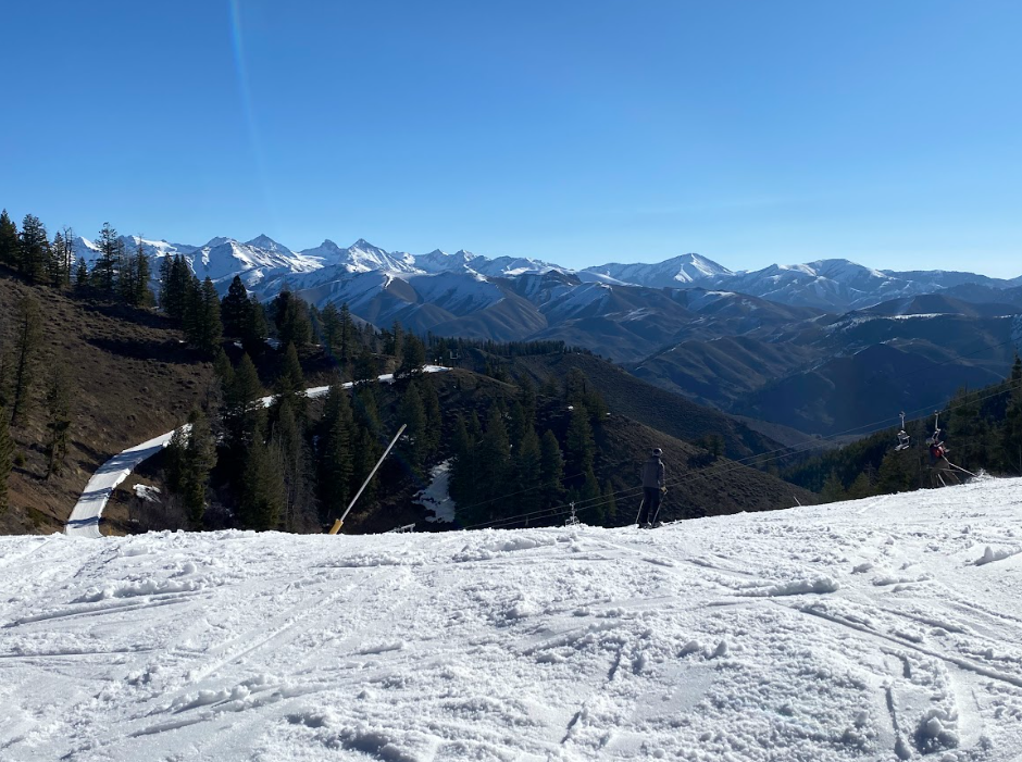 ski run looking out over brown bare hillsides