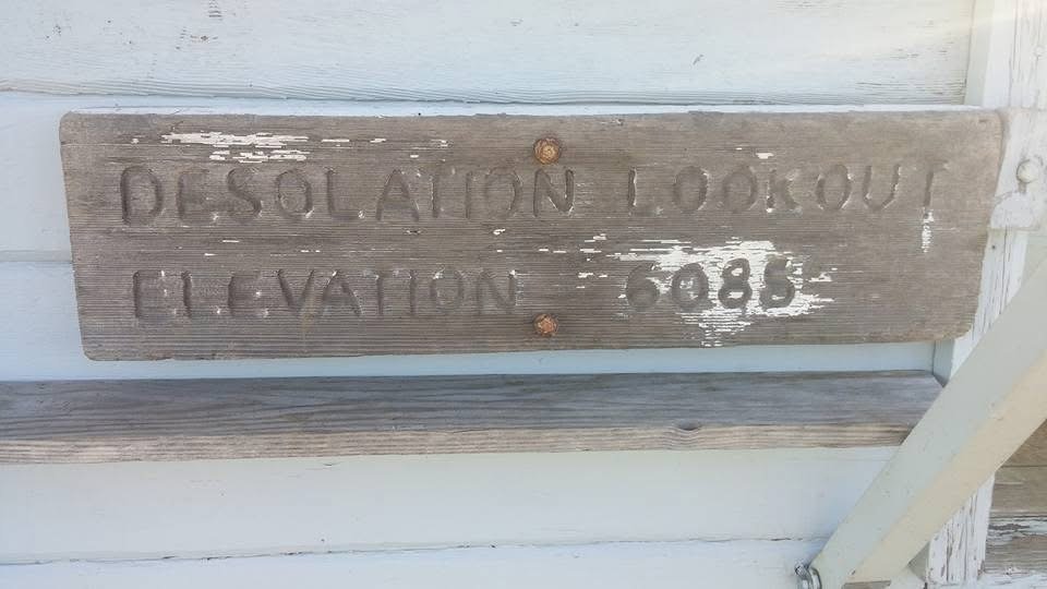 wood sign reads Desolation Lookout elevation 6088