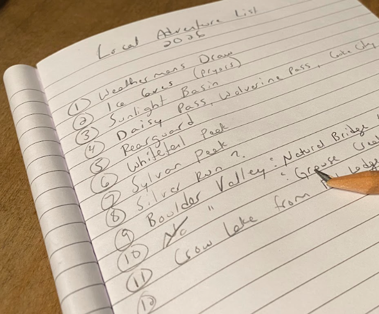 handwritten list of eleven random trail names such as Rearguard and Boulder Valley