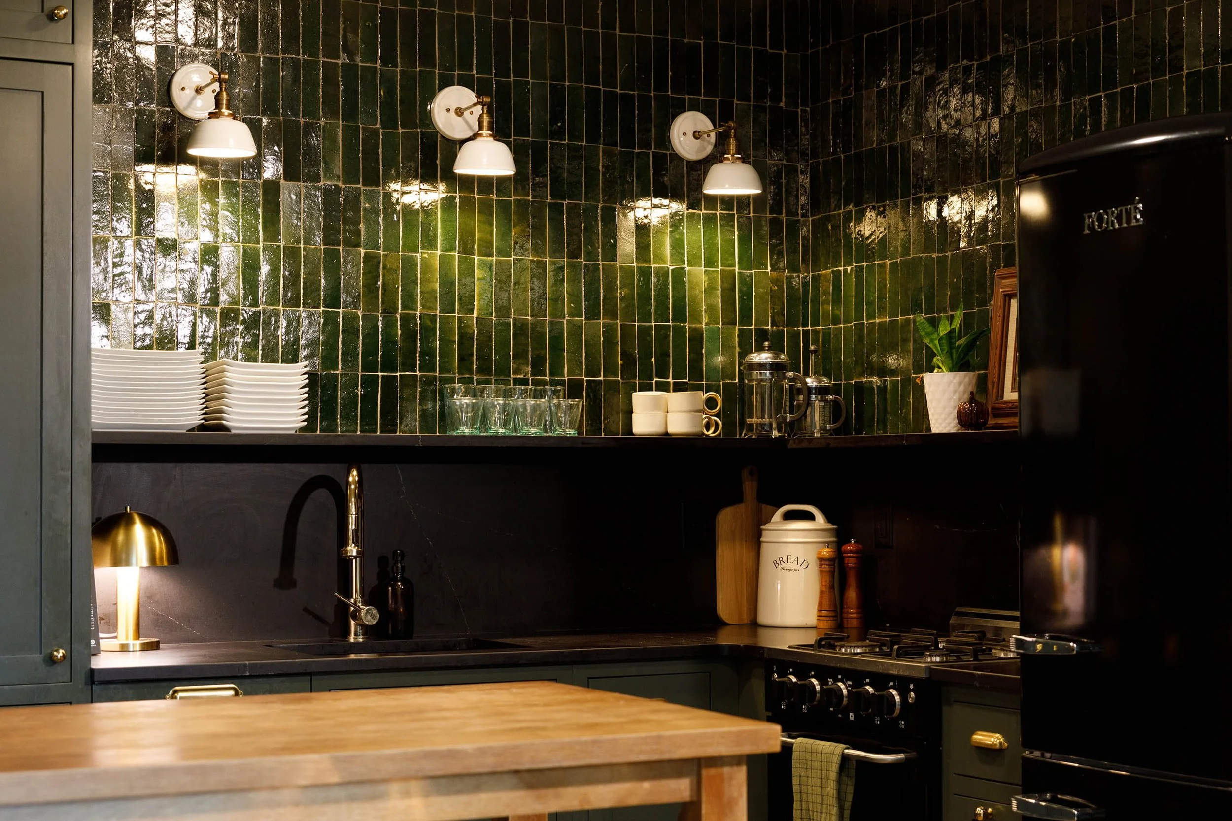 High end green and black kitchen remodel in Marquette Michigan