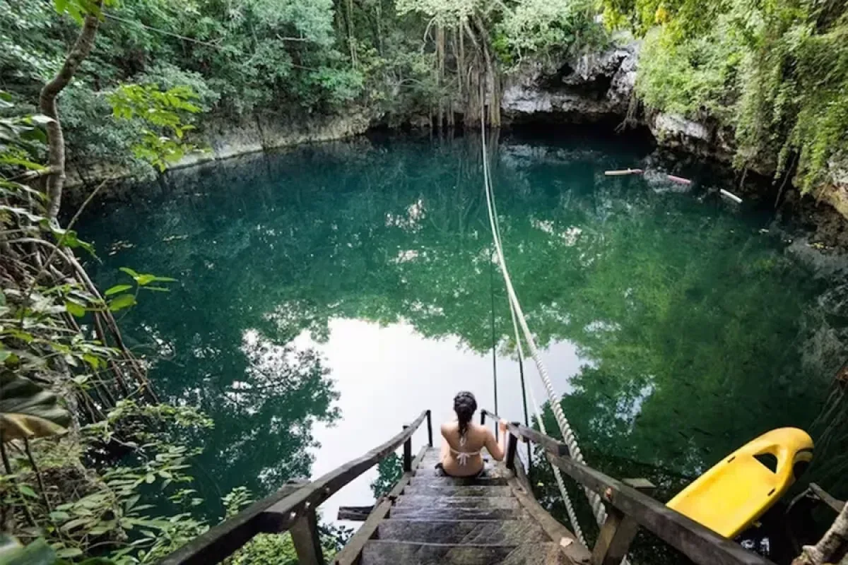 Cenote Verde Lucero near Puerto Morelos with crystal-clear freshwater and lush jungle surroundings