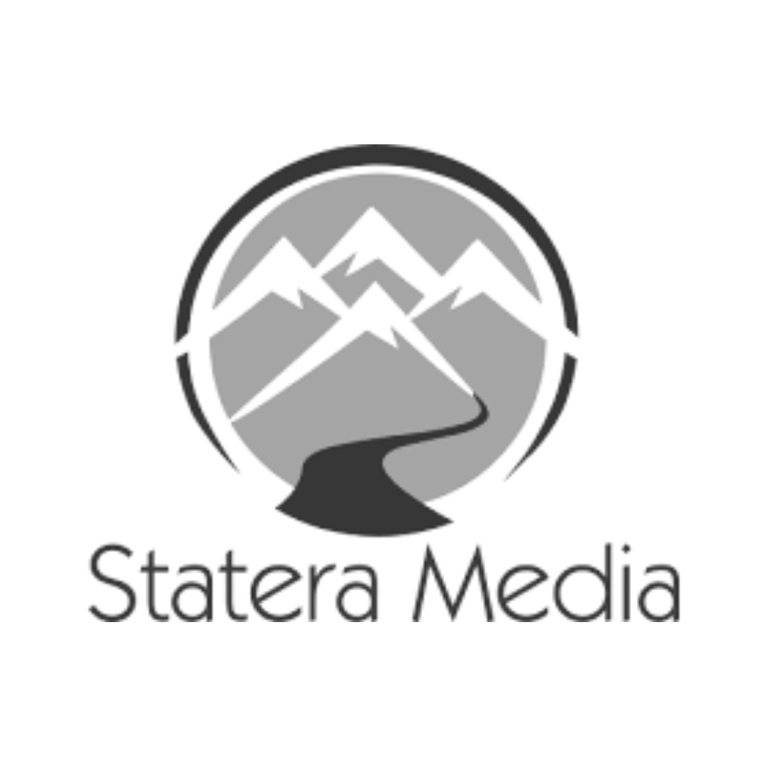 A circular logo featuring mountains with a winding road leading towards them, and the text "Statera Media" below.