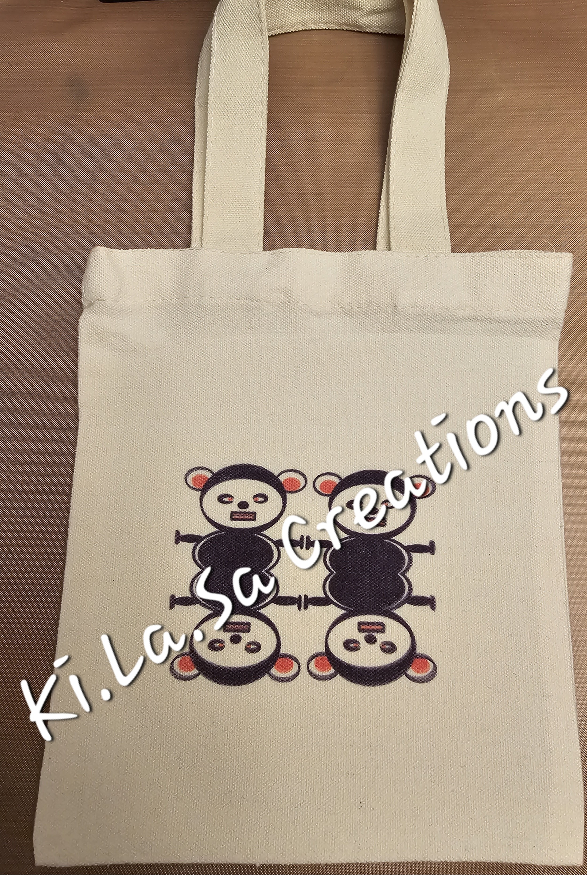 4 Pandas Tote bag.jpg
