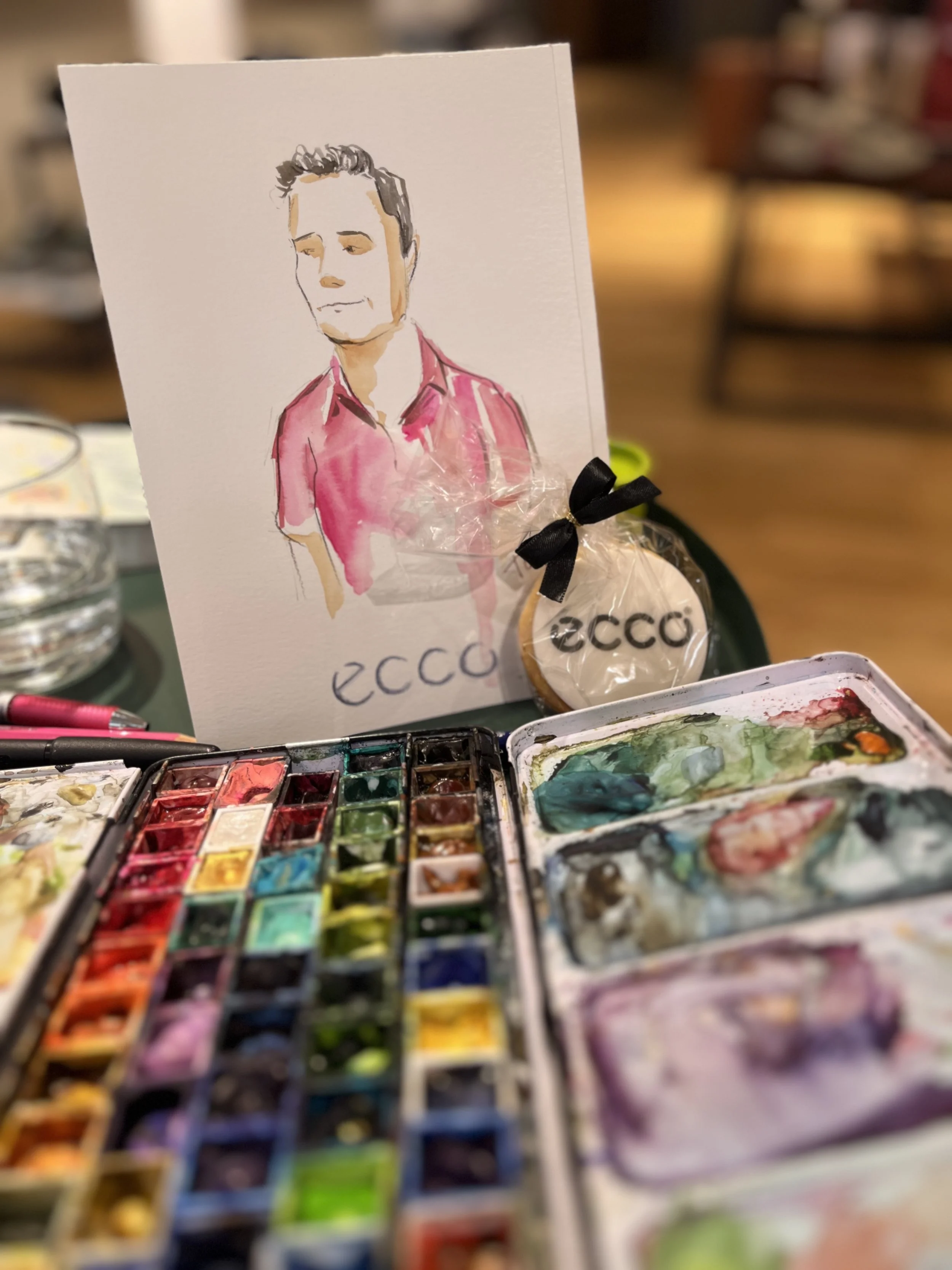 Portrait eines Mannes mit Keks und Aquarellkasten