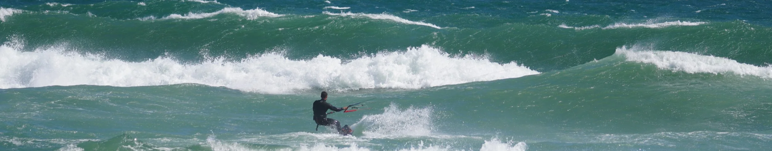 kitesurfer in gusty conditions