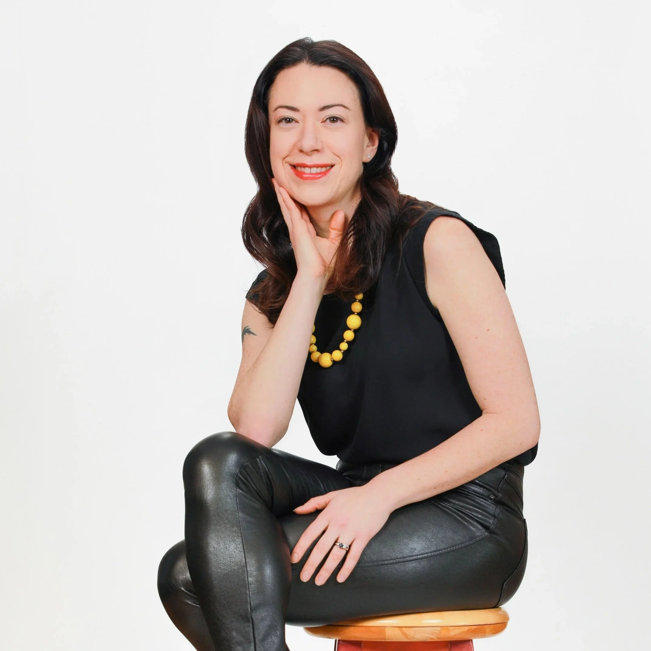 A headshot of Kimberly Smathers of Flourishing Spark who offers health and human services strategy, strengths coaching, and trauma-informed consulting for purpose-driven organizations.