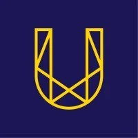 The IDEO U badge for Human-Centered Systems Thinking— a geometric logo with yellow lines forming a stylized shield or crest on a dark blue background.