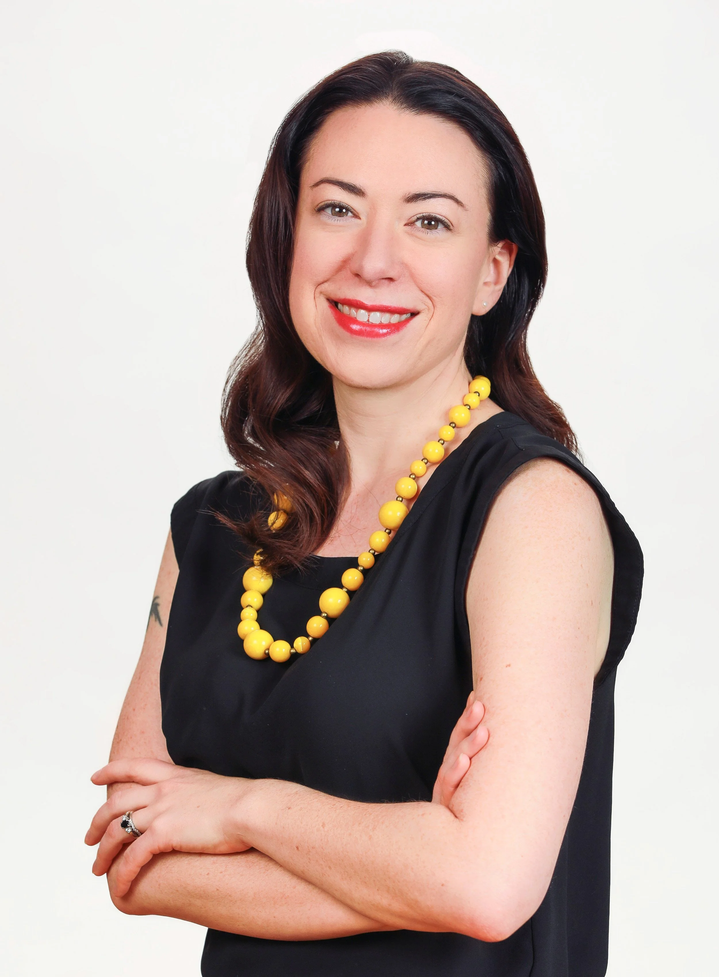 Portrait of Kimberly Smathers, a design thinking consultant helping mission-driven organizations with strategy, systems change, and team development.