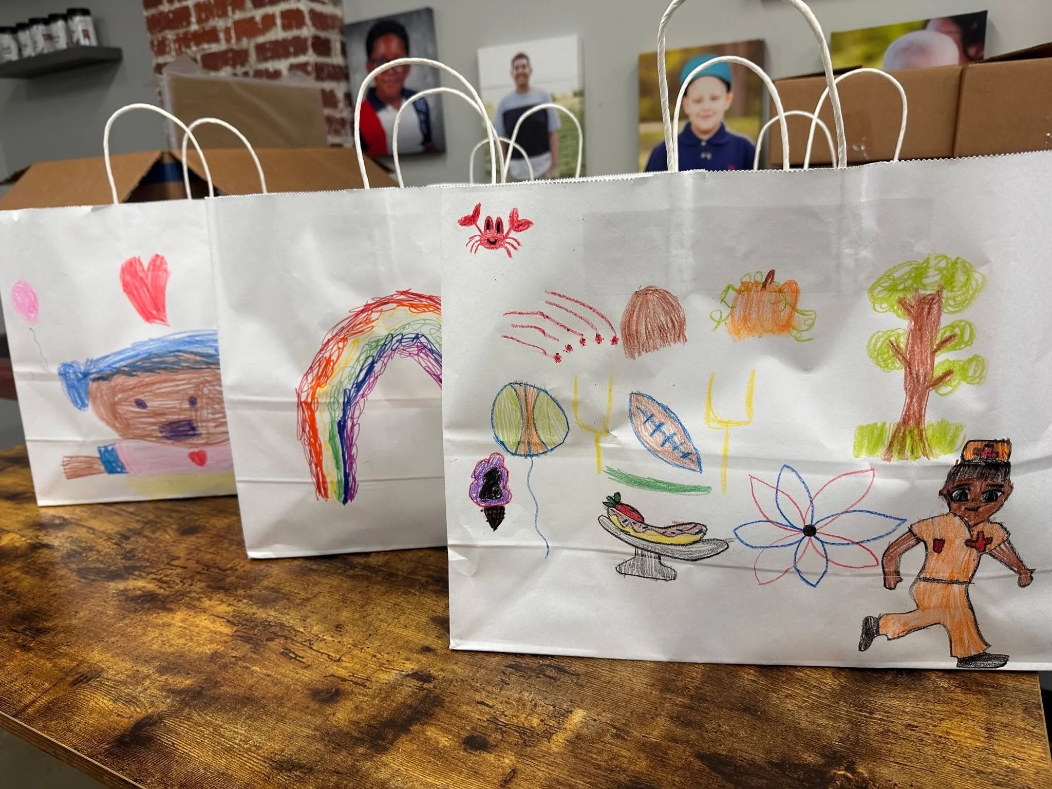 We are so excited to hand out snack deliveries to FGP families in these bags lovingly decorated by Salem Village Academy students! They are adorable and will surely elicit smiles when delivered! Thank you Salem Village Academy for the snacks and the 