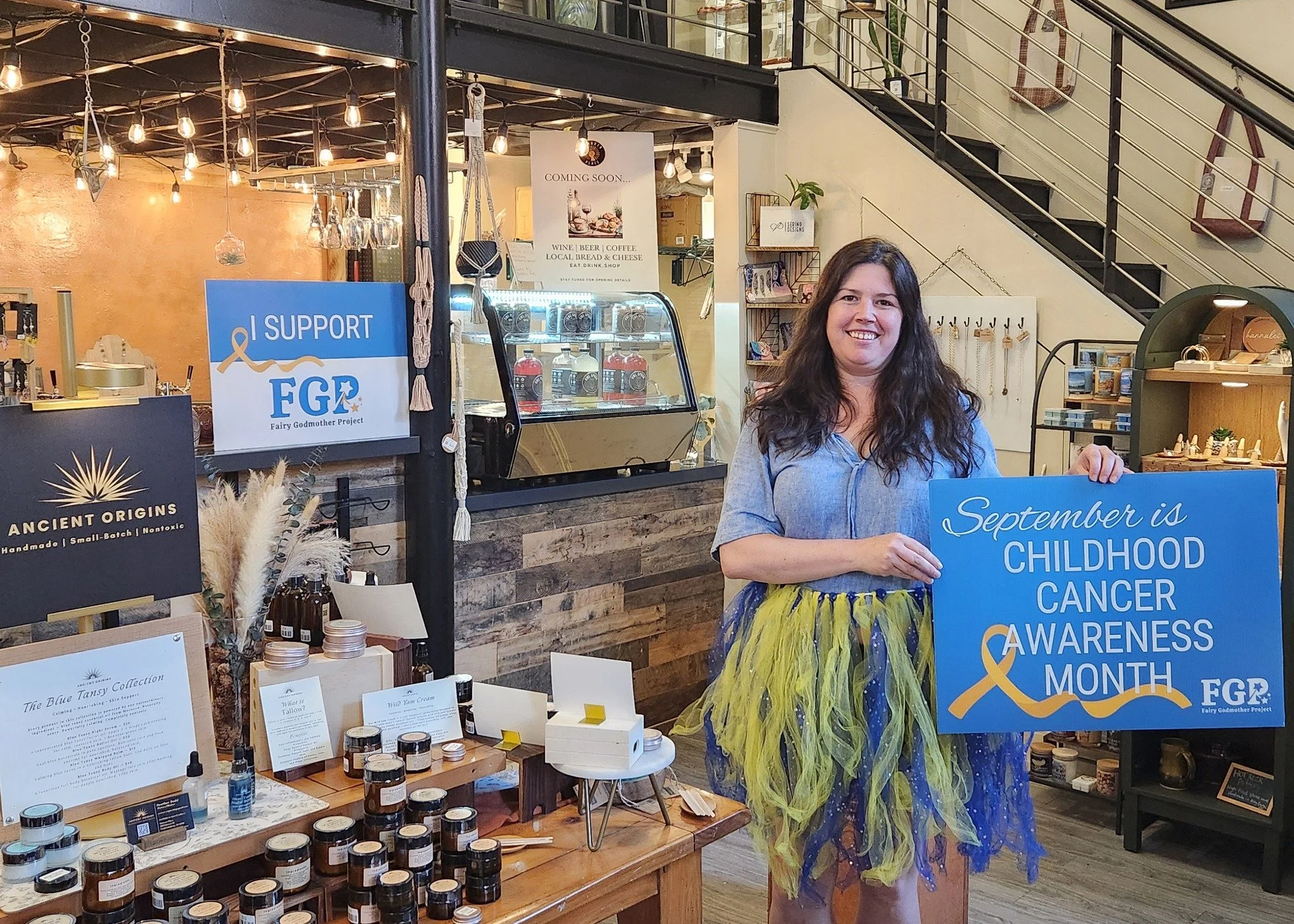 Hanover Place FXBG is showing their support for Childhood Cancer Awareness Month! 💛 Hanover Place is an artisan boutique in the heart of downtown Fredericksburg, featuring handmade goods from local artisans alongside thrifted and vintage finds. 

🎗