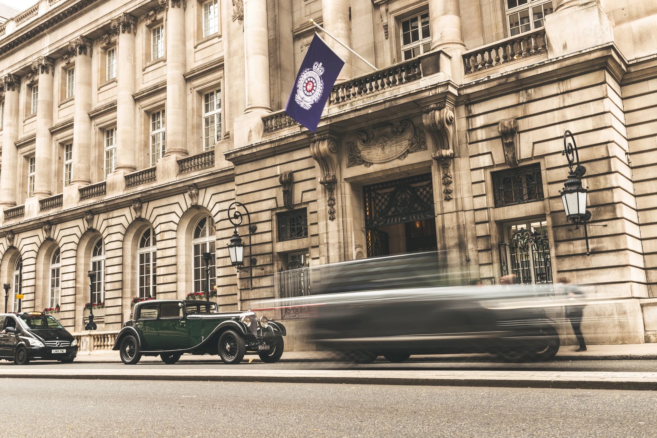 Vintage Bentley outside the RAC Club in Pall Mall, reflecting Sine Mora’s work within luxury automotive and established cultural environments